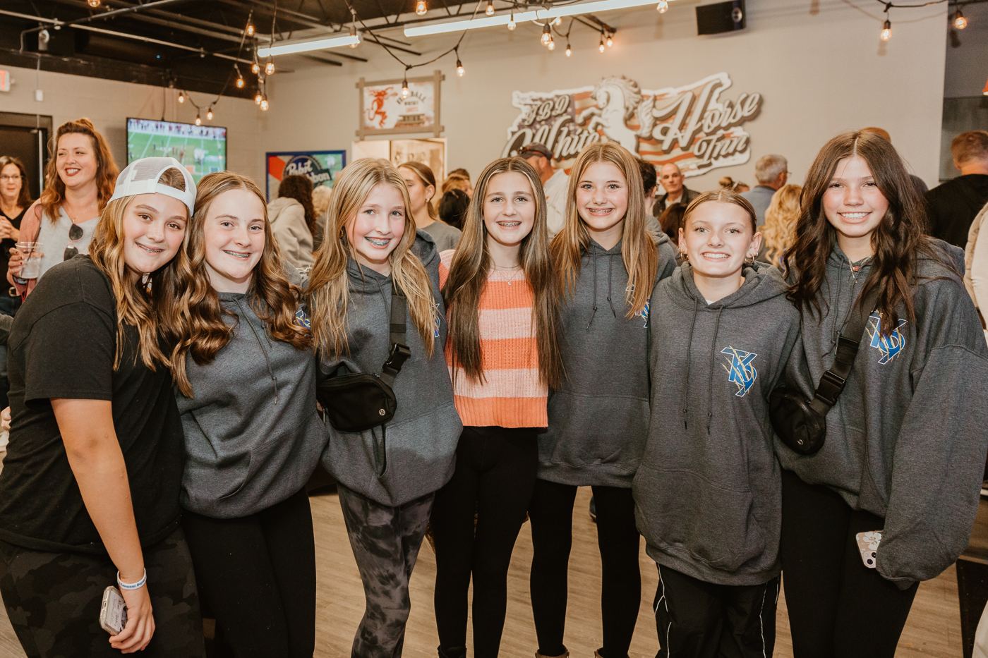 A group in TK9 sweatshirts