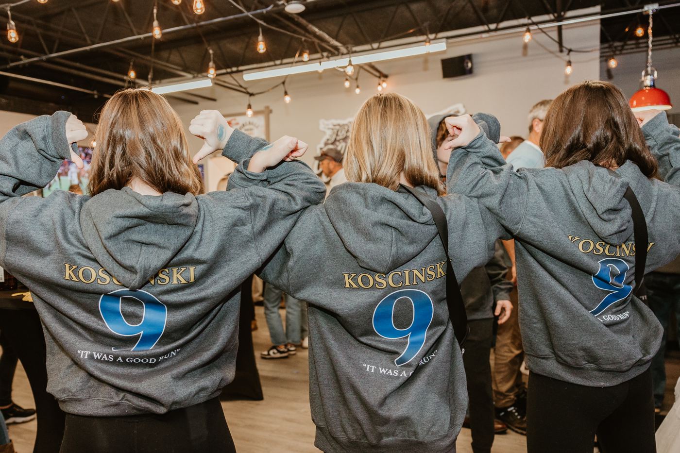 Koscinski 9 on the backs of supporters