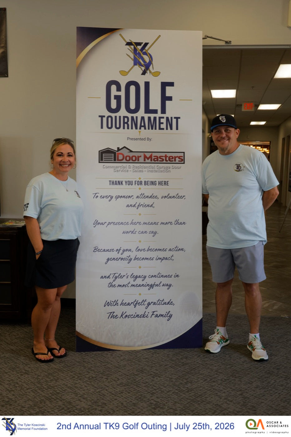 Volunteers welcome golfers at the TK9 Golf Tournament banner
