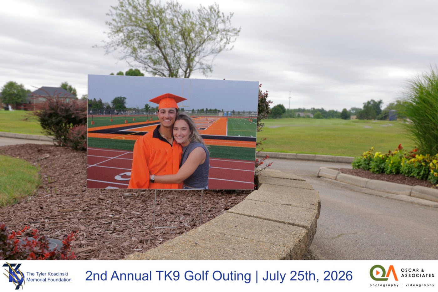 A photo of Tyler on display along the course at Broken Arrow Golf Club