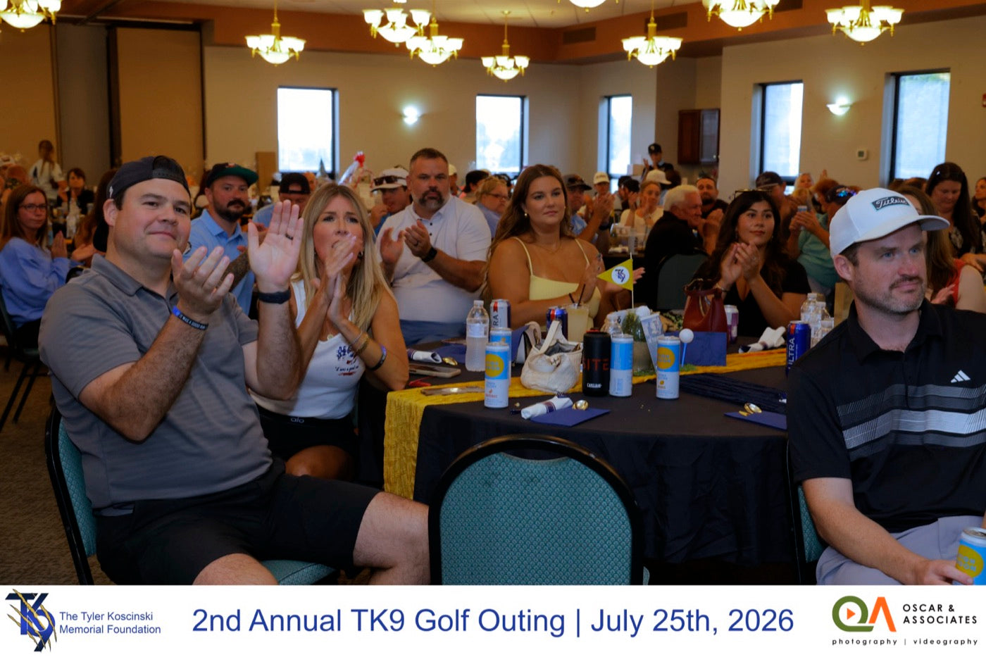 Guests cheering at the banquet