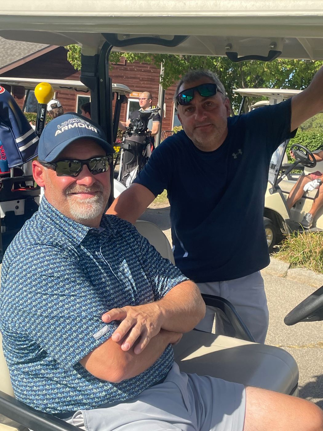 Golfers in a cart