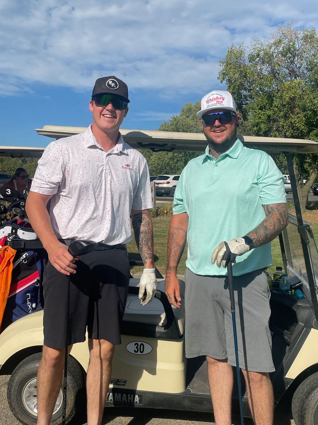 Two golfers on the course